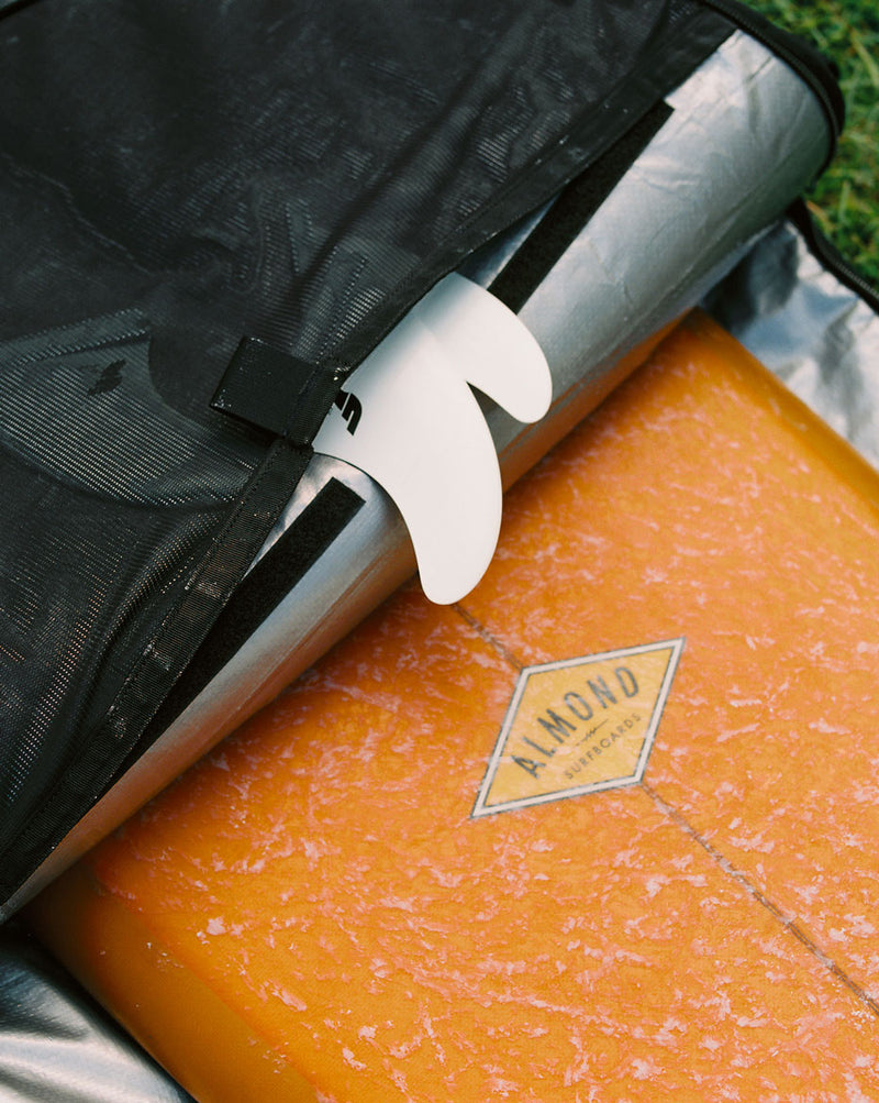 Herschel Supply Co Surfboard Sleeve All Purpose 6ft 6in in all colors, showing a collection of multiple surfboard sleeves arranged together.