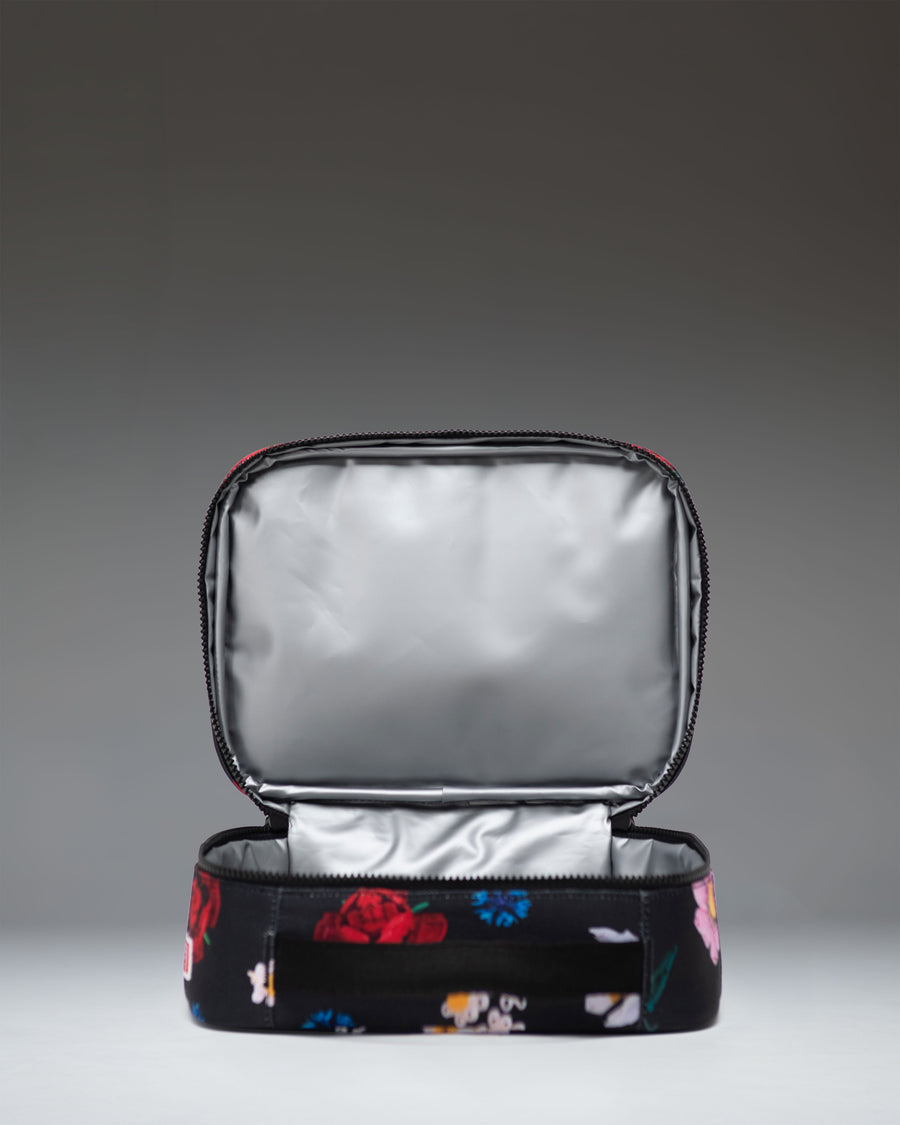 Herschel Supply Co. LEGO Pop Quiz Lunch Box in Falling Florals floral print.