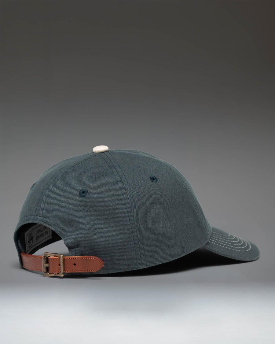 Herschel Supply Co. Sylas Premium Cap in Green Gables with vintage white contrast stitching, showing a front view of the structured baseball hat.