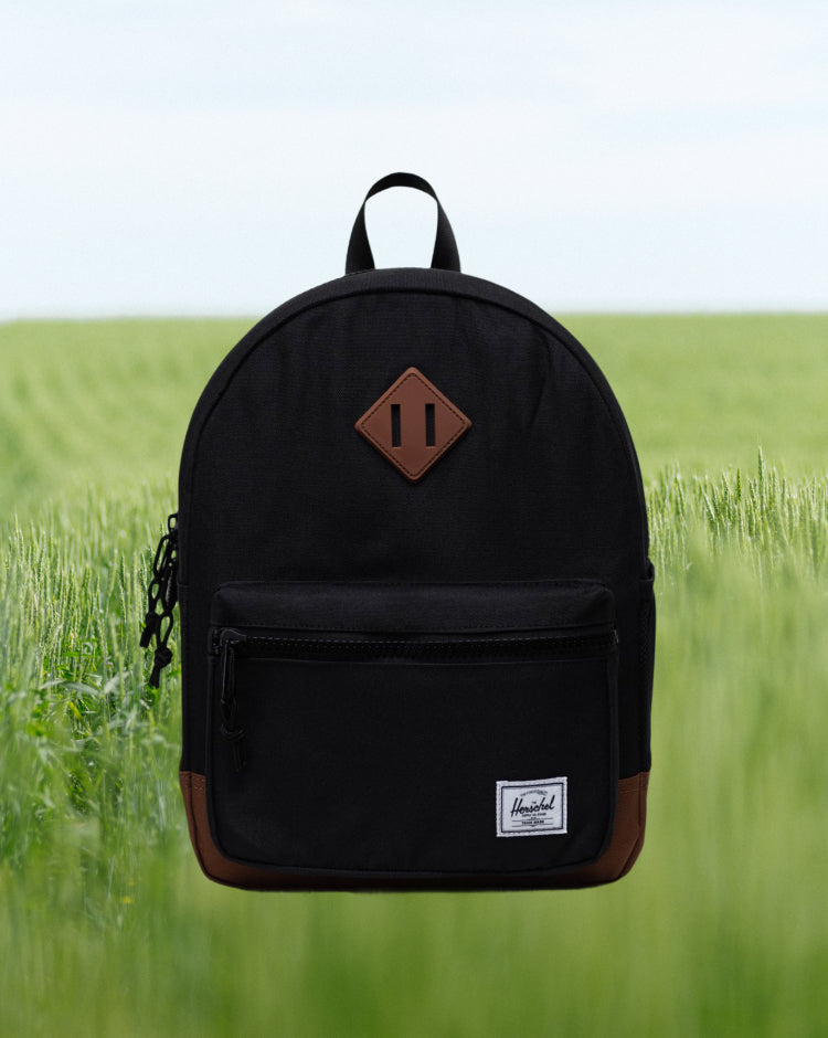 Herschel Supply Co. Herschel Heritage Kids Backpack in Black/Saddle Brown.