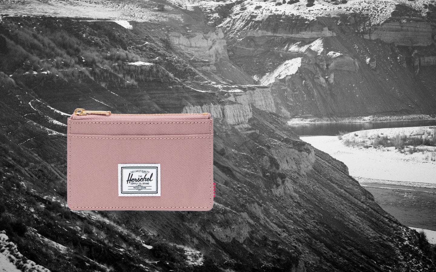 Herschel Supply Co. Oscar Cardholder in Ash Rose pink, featuring a compact design with multiple card slots and a main storage sleeve.