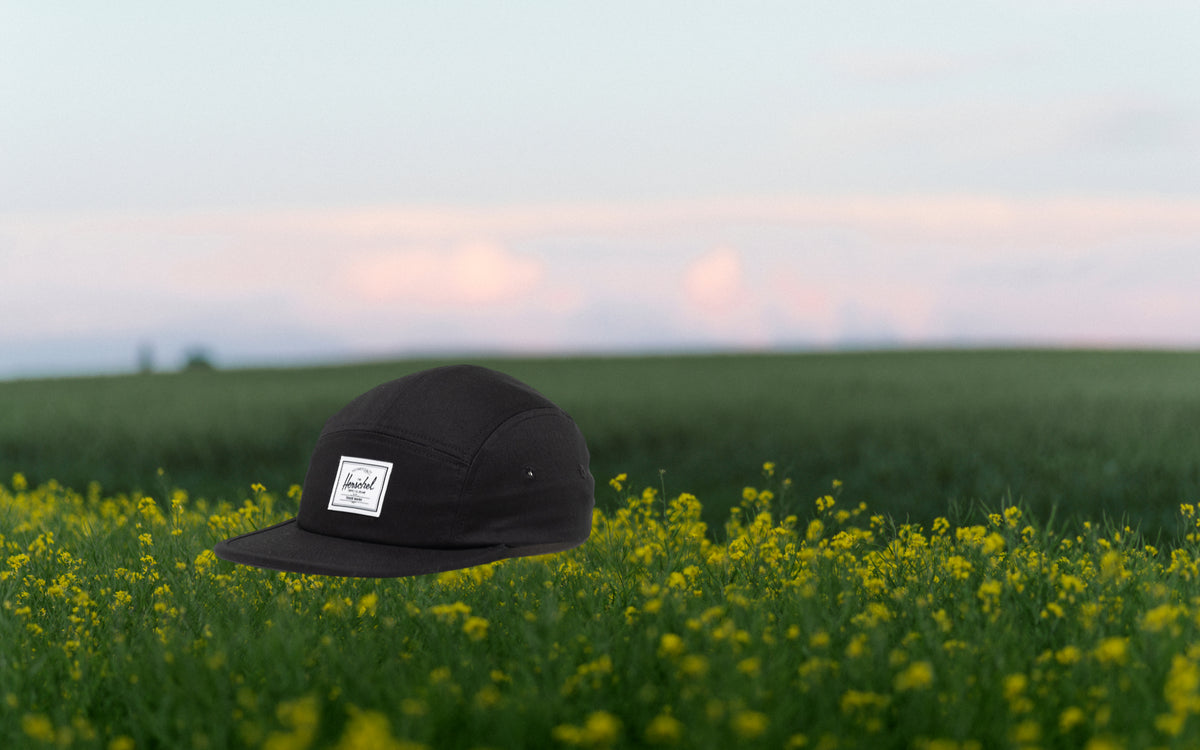 Herschel Supply Co. Glendale Kids Cap in black, shown from the front on a plain background.